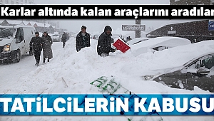 Uludağ'da tatilciler karlar altında kalan araçlarını böyle aradı