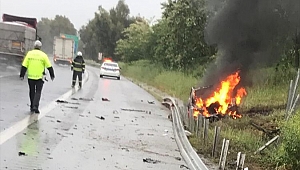 Bariyerlere çarpan otomobil alev aldı: 2 yaralı