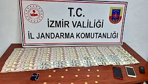 İzmir'de kendilerini polis olarak tanıtan dolandırıcılar vatandaşı tuzağına düşürdü