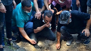 Ağabeyi toprağı öperek mezarına attı