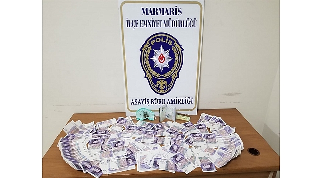 Marmaris'te sahte parayla yakalanan İngiliz turist gözaltına alındı