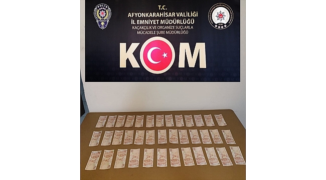 Sahte parayla cep telefonu alan zanlı yakalandı