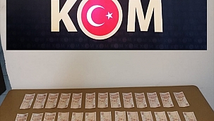 Sahte parayla cep telefonu alan zanlı yakalandı