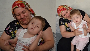 Görmüyor, duymuyor anne sevgisiyle hayata tutunuyor