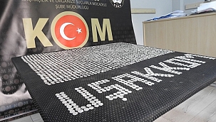 Uşak'ta polis bir otomobilde 2002 sikke yakaladı