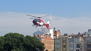 İzmir'de hava ambulansı ayağı tarım makinesine sıkışan çiftçi için havalandı