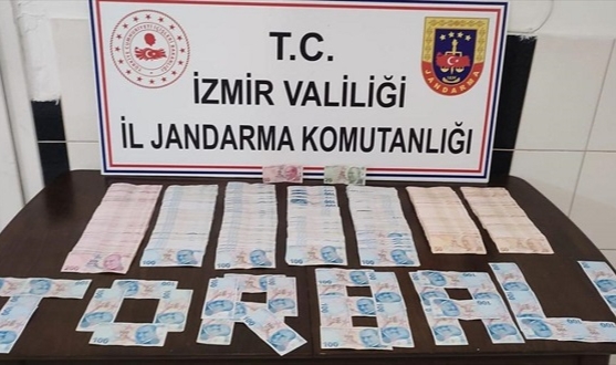 İzmir&#039;de yazılım açığını kullanarak ATM&#039;den para çeken şüpheli yakalandı