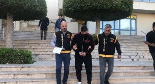 Kayıp çantanın sahibi kırmızı bültenle aranan şüpheli çıktı