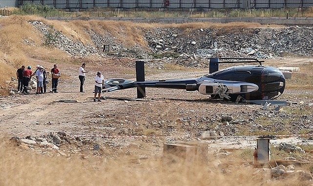 İzmir'de arızalanan helikopter boş araziye indiği sırada yan yattı