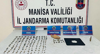 Manisa'da bir evde 180 parça tarihi eser ele geçirildi