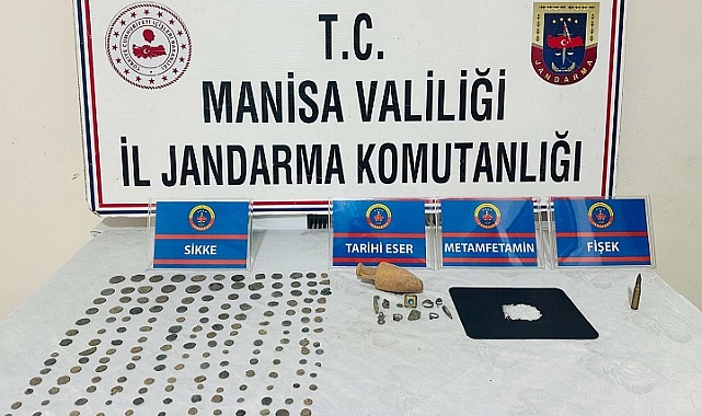 Manisa'da bir evde 180 parça tarihi eser ele geçirildi