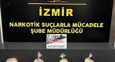 İzmir'de otomobilinde 8 kilogram uyuşturucu bulundu tutuklandı