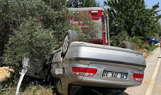 Ödemiş'te takla atan otomobildeki 2 kişi yaralandı